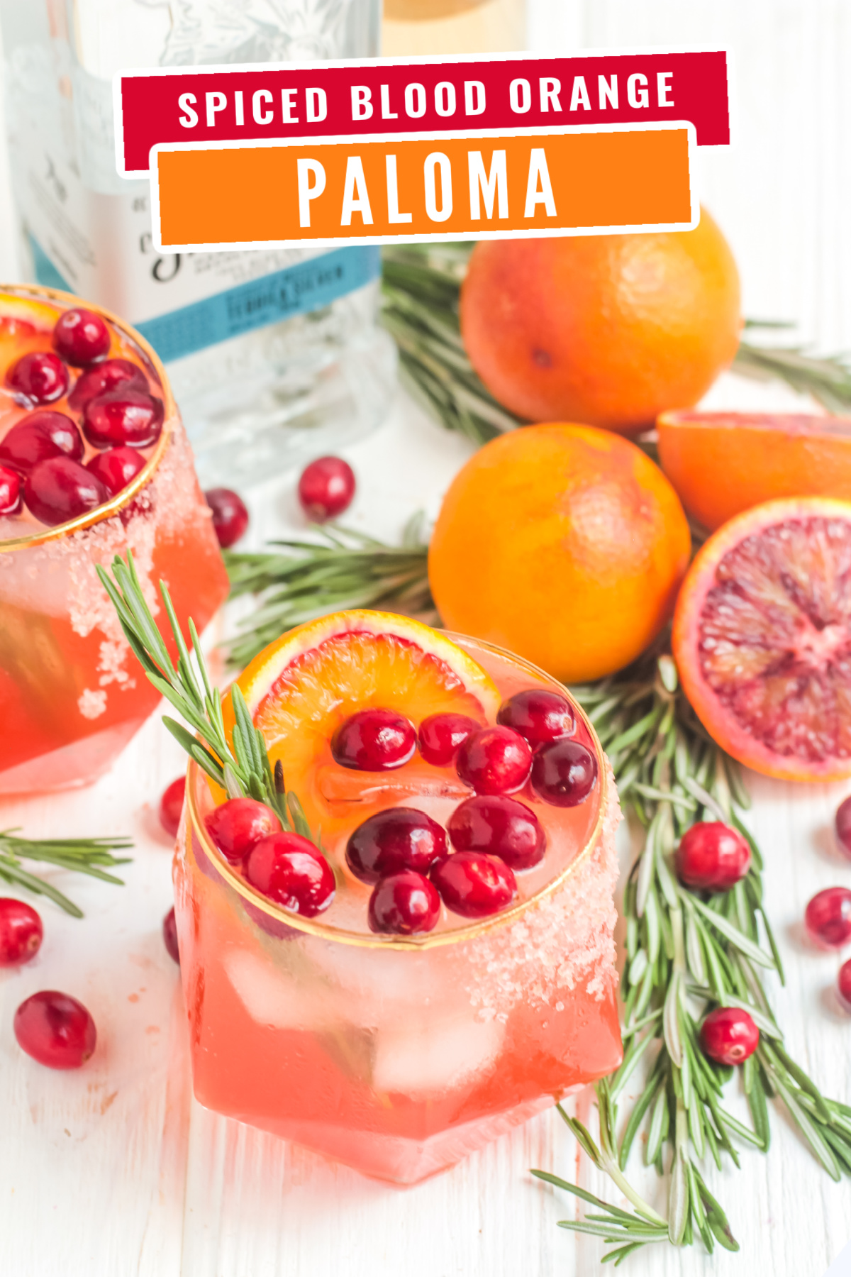 This festive Spiced Blood Orange Paloma Recipe is perfect for Christmas gatherings! This paloma recipe is citrusy, spiced and delicious.
