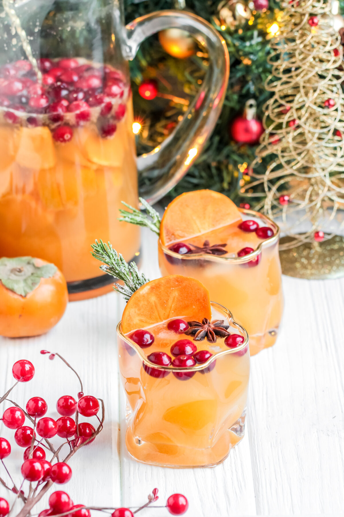 Ring in the Christmas season with this delicious and festive Persimmon White Wine Sangria Recipe! Perfect for holiday parties!