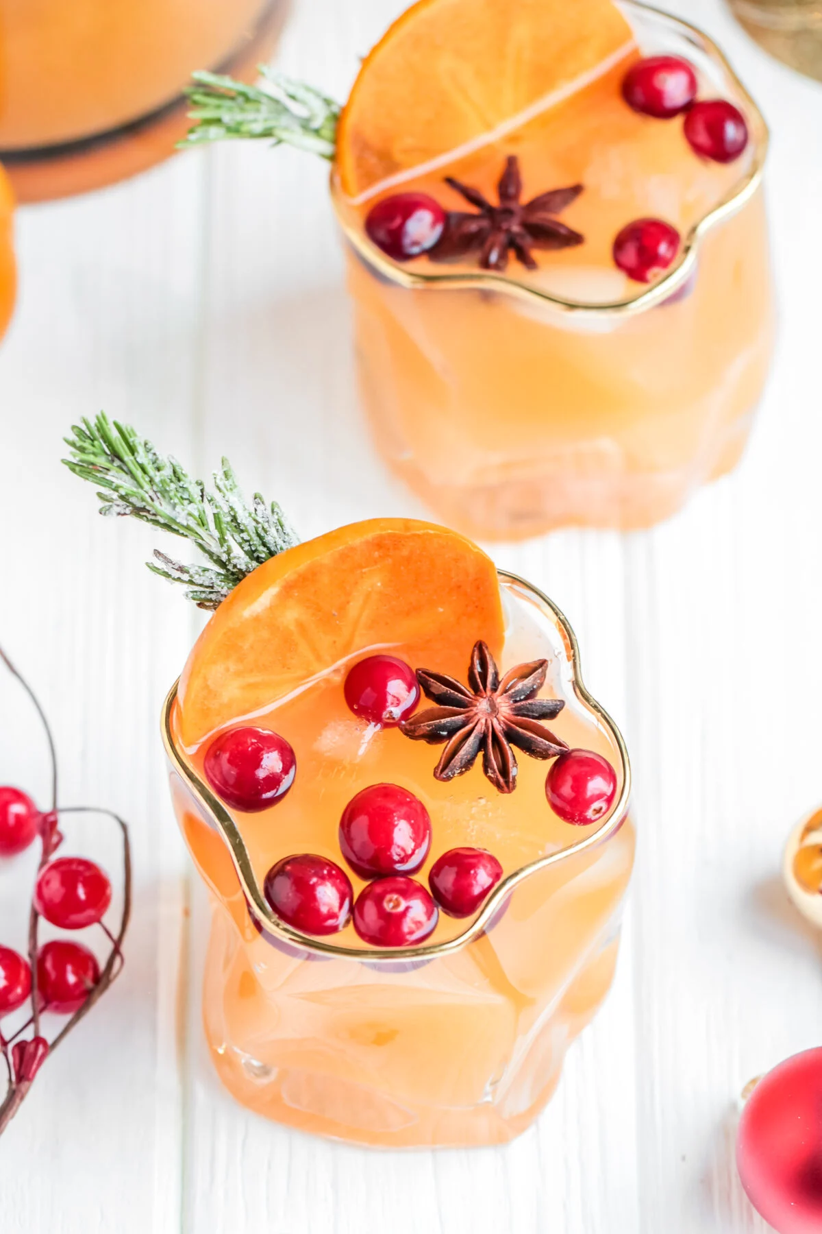Ring in the Christmas season with this delicious and festive Persimmon White Wine Sangria Recipe! Perfect for holiday parties!