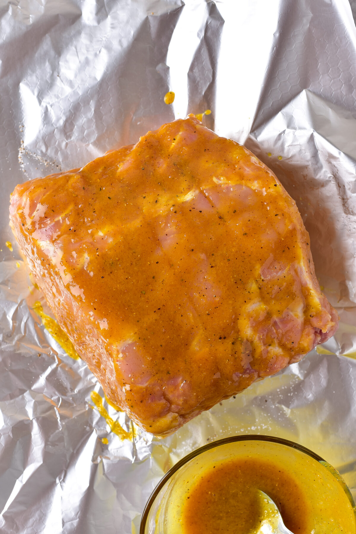 Pork loin covered in honey mustard glaze.