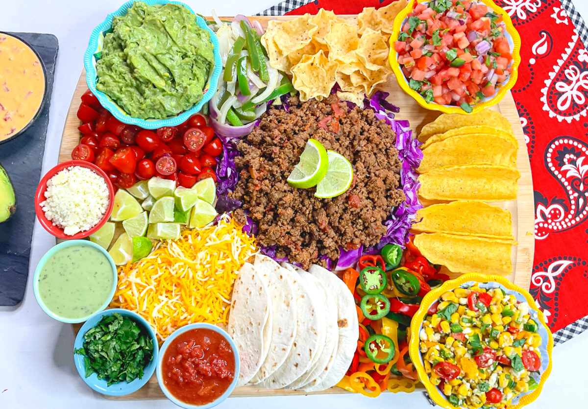 Love Taco Tuesday? This easy DIY taco dinner board is perfect for your next fiesta! It's easy to make and perfect for any occasion.