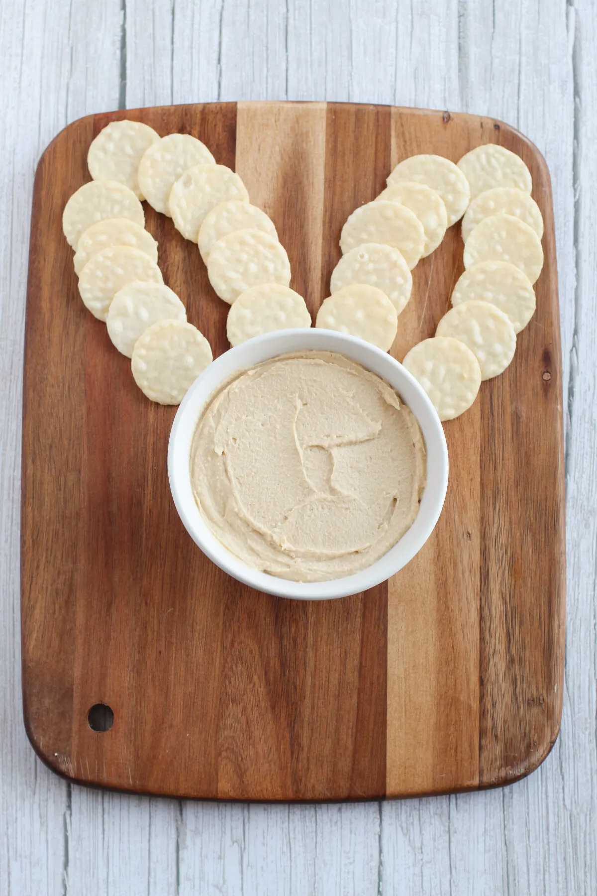 Hummus placed in a dish under the "ears".