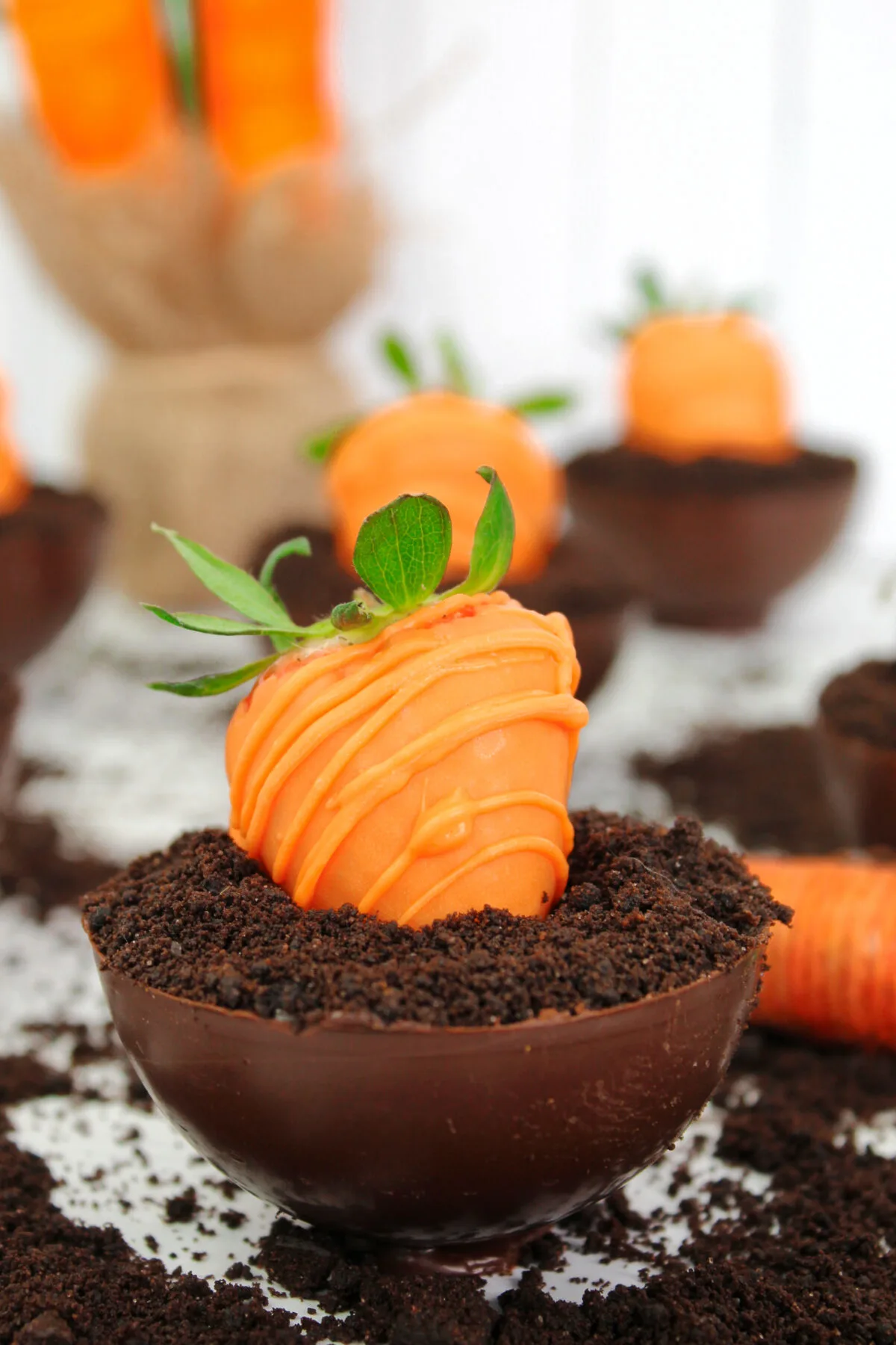 Make Easter extra special with Carrot Patch Chocolate Bowls, made with Brownie pieces, chocolate ganache, and a chocolate dipped strawberry.