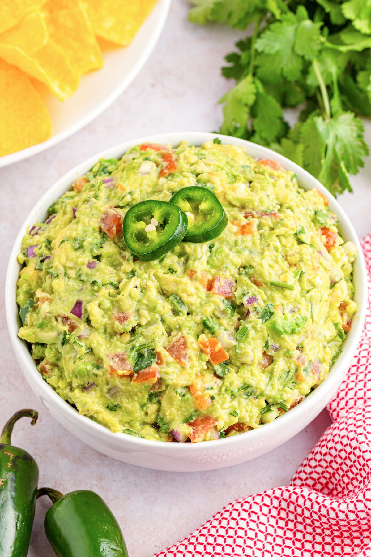 Make your next party or taco Tuesday extra special with this delicious and easy chunky guacamole recipe made with fresh ingredients!