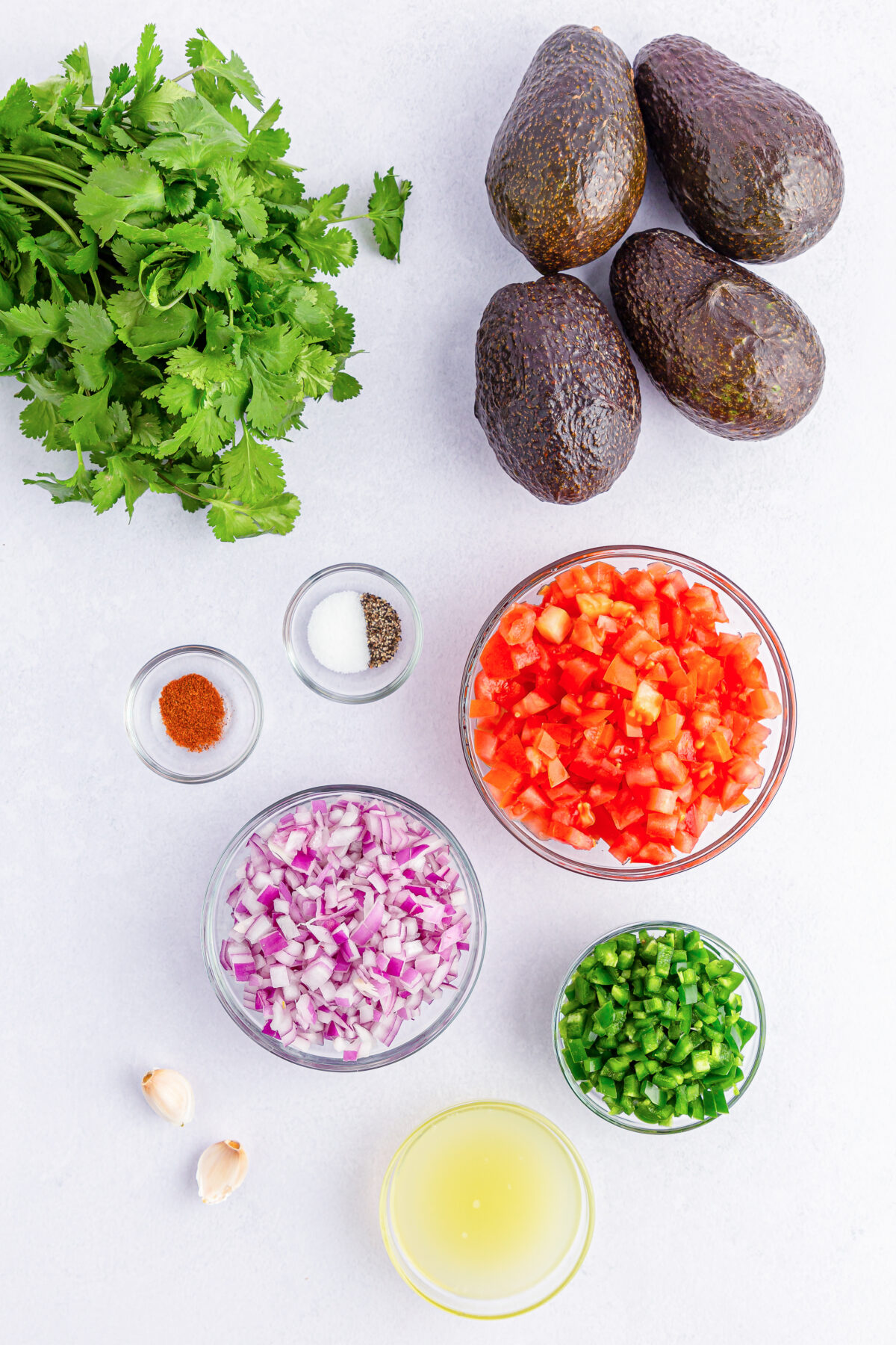 Ingredients for homemade chunky guacamole.