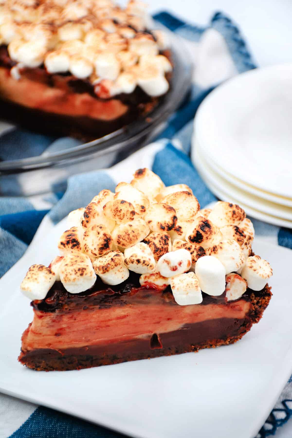 Indulge in our Texas Flood Pie recipe - layers of chocolate ganache and peanut butter mousse all topped with a heap of toasted marshmallows!