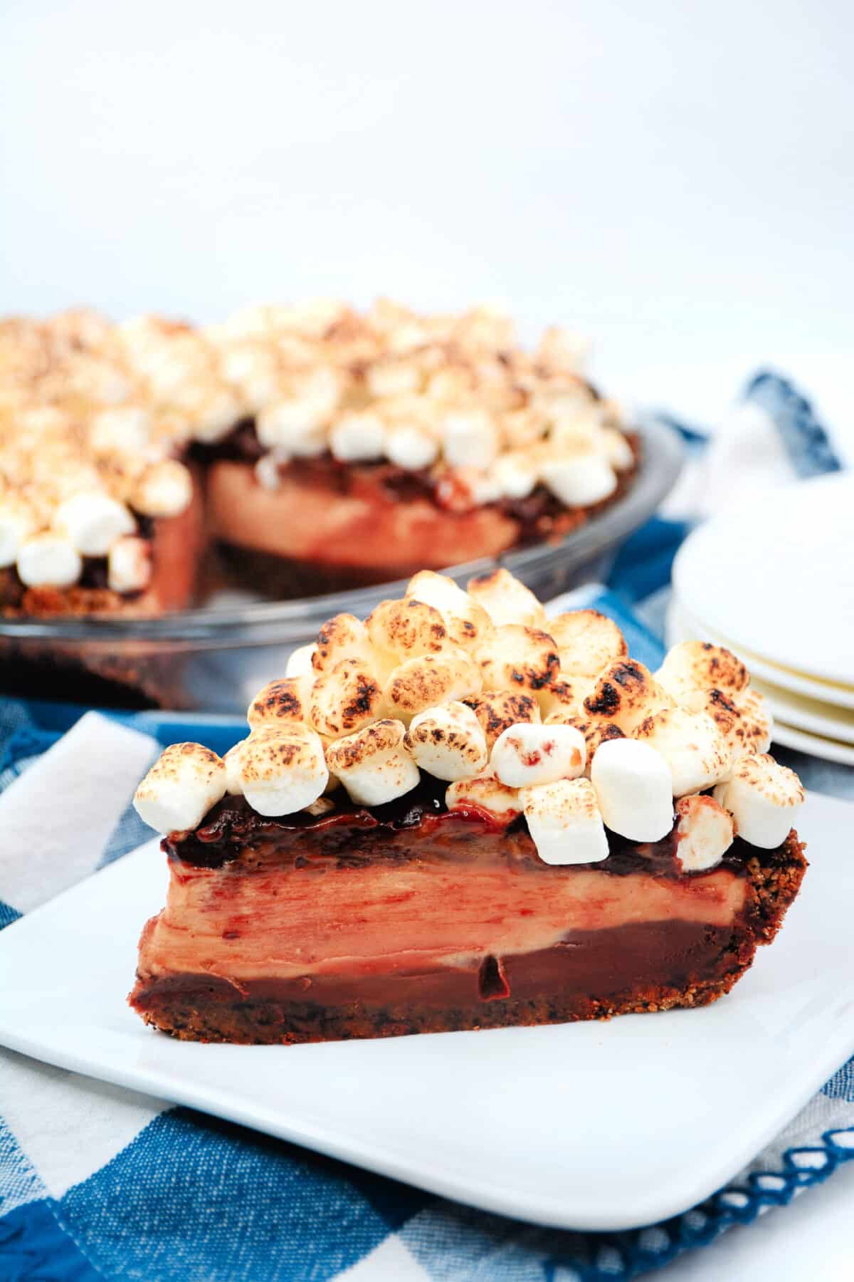 Indulge in our Texas Flood Pie recipe - layers of chocolate ganache and peanut butter mousse all topped with a heap of toasted marshmallows!