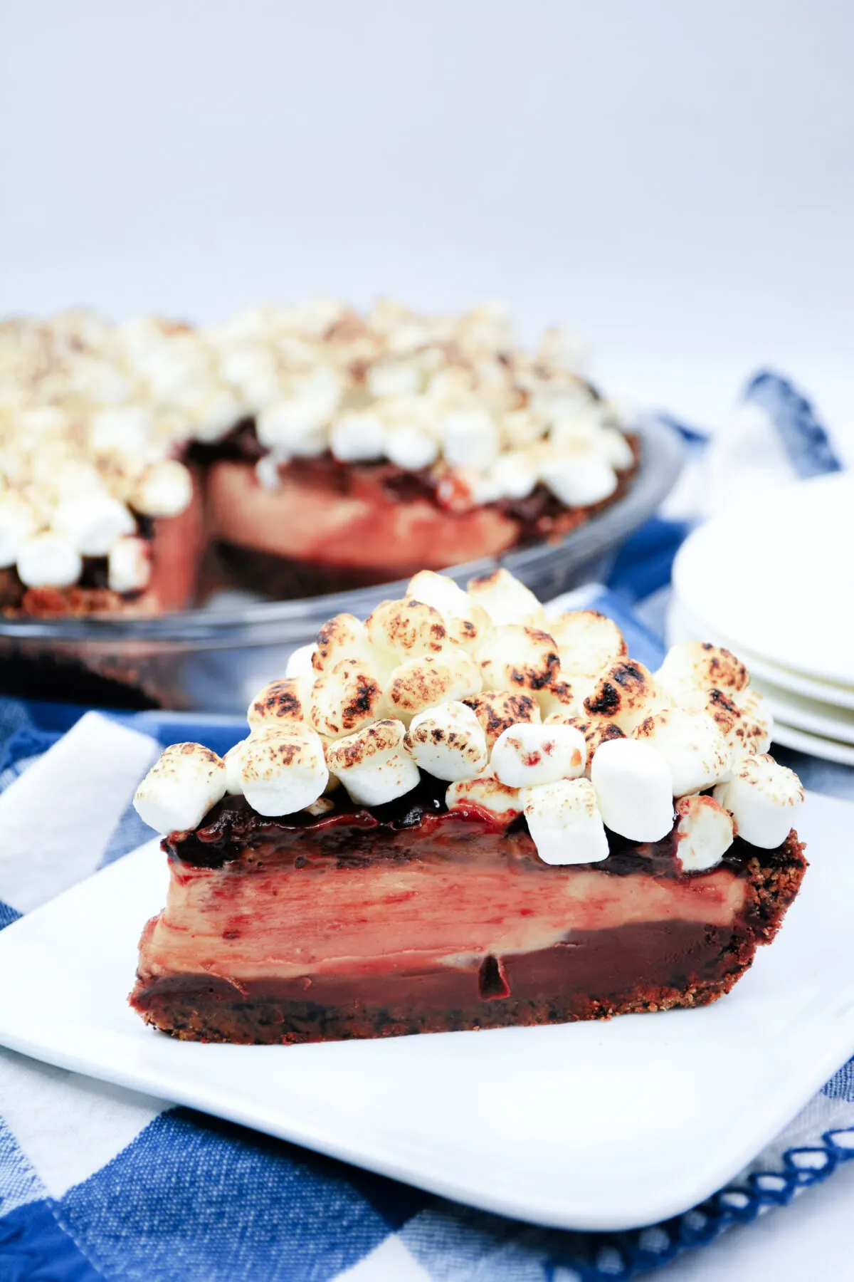 Indulge in our Texas Flood Pie recipe - layers of chocolate ganache and peanut butter mousse all topped with a heap of toasted marshmallows!