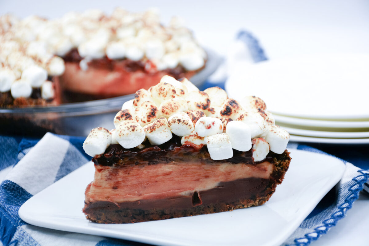 Indulge in our Texas Flood Pie recipe - layers of chocolate ganache and peanut butter mousse all topped with a heap of toasted marshmallows!