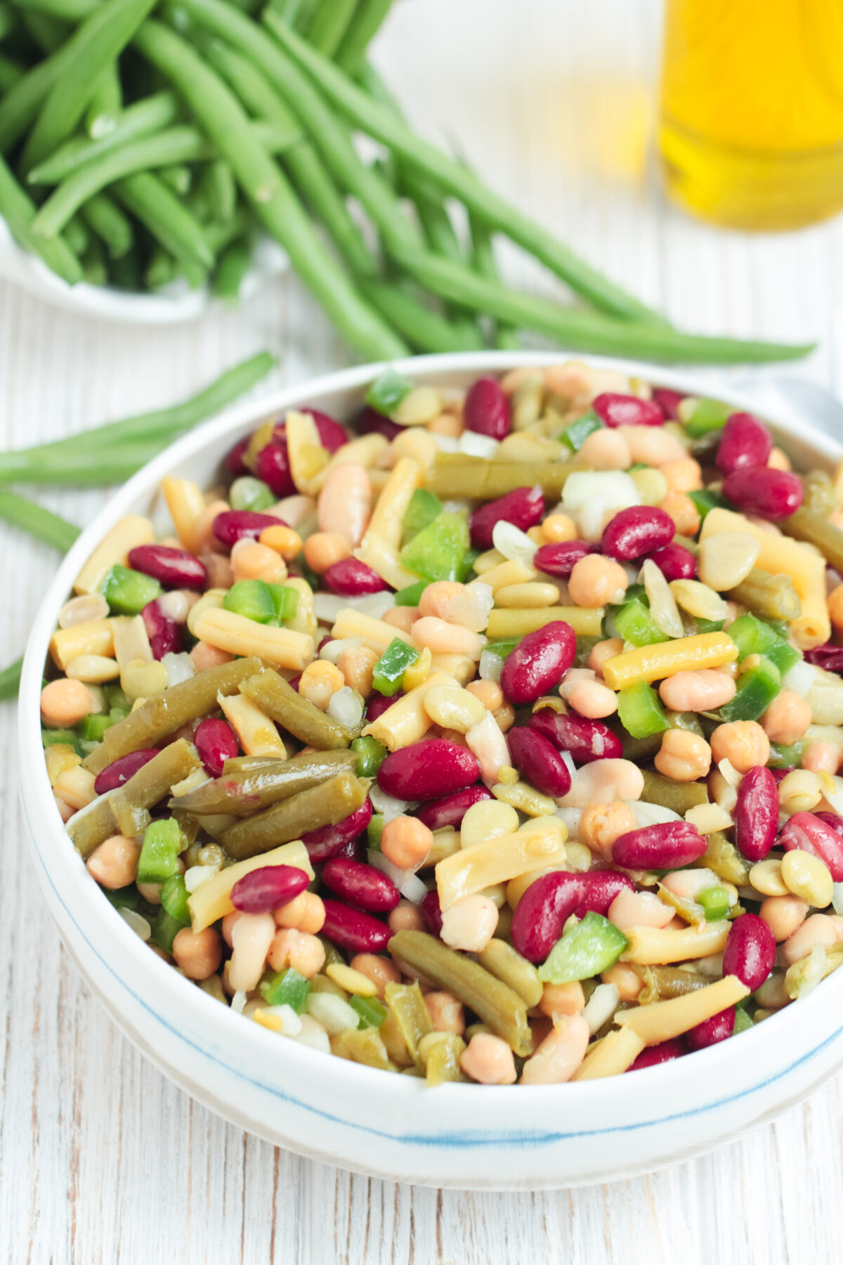 Make this simple, yet delicious 5 bean salad recipe in just 10 minutes. Perfect for potlucks and BBQs, this easy salad is sure to impress!