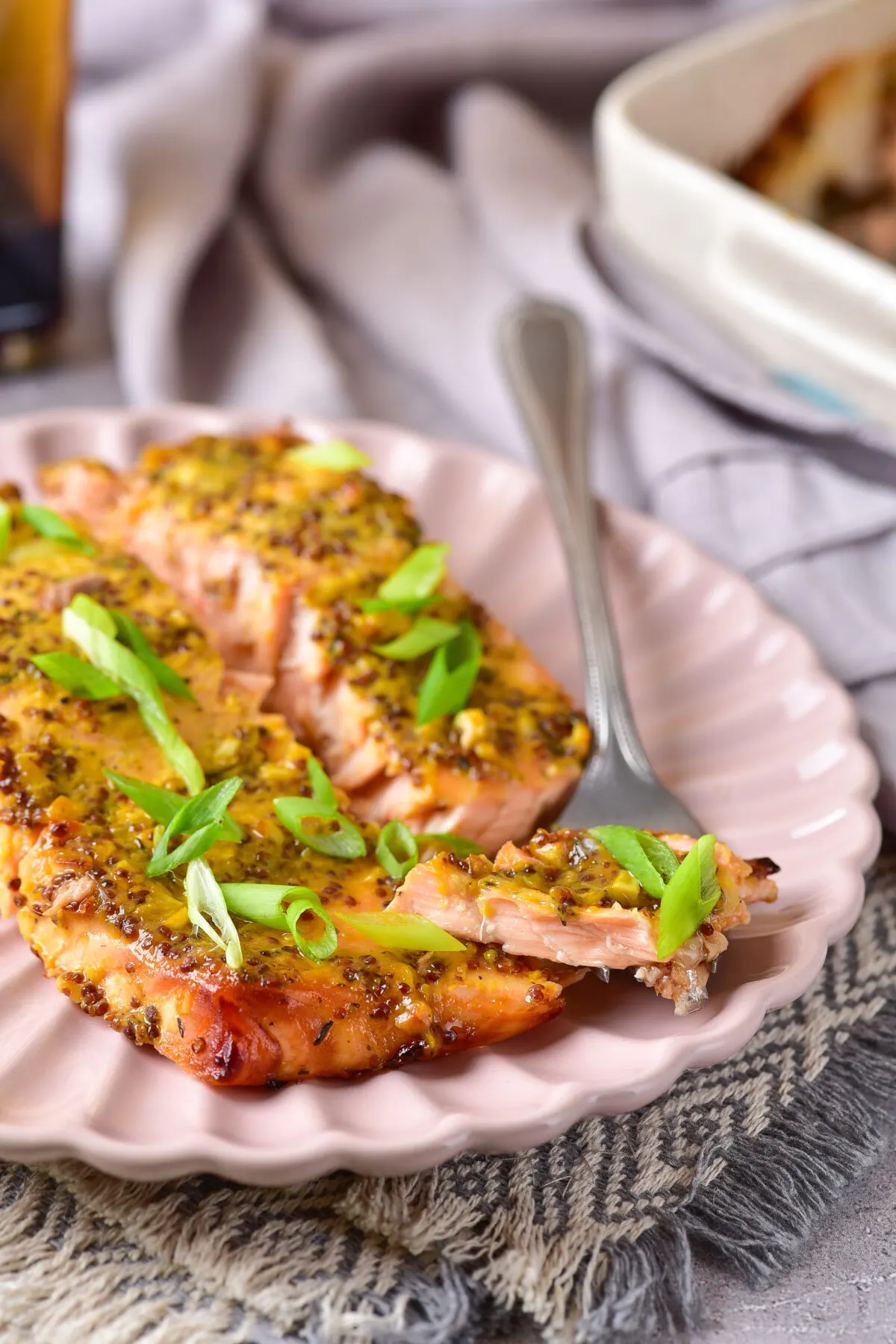 Dive into our Baked Honey Mustard Salmon recipe - a deliciously simple dinner idea! Perfectly seasoned for a mouthwatering meal every time.