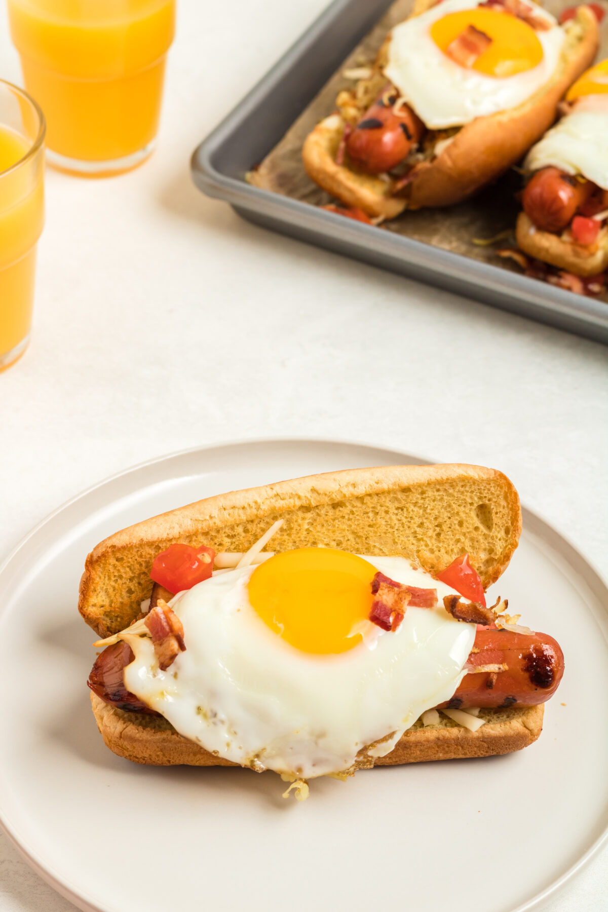 A tasty twist on the classic, our breakfast hot dogs feature hash browns, bacon, cheese, and a sunny side up egg. Great for any time of day!